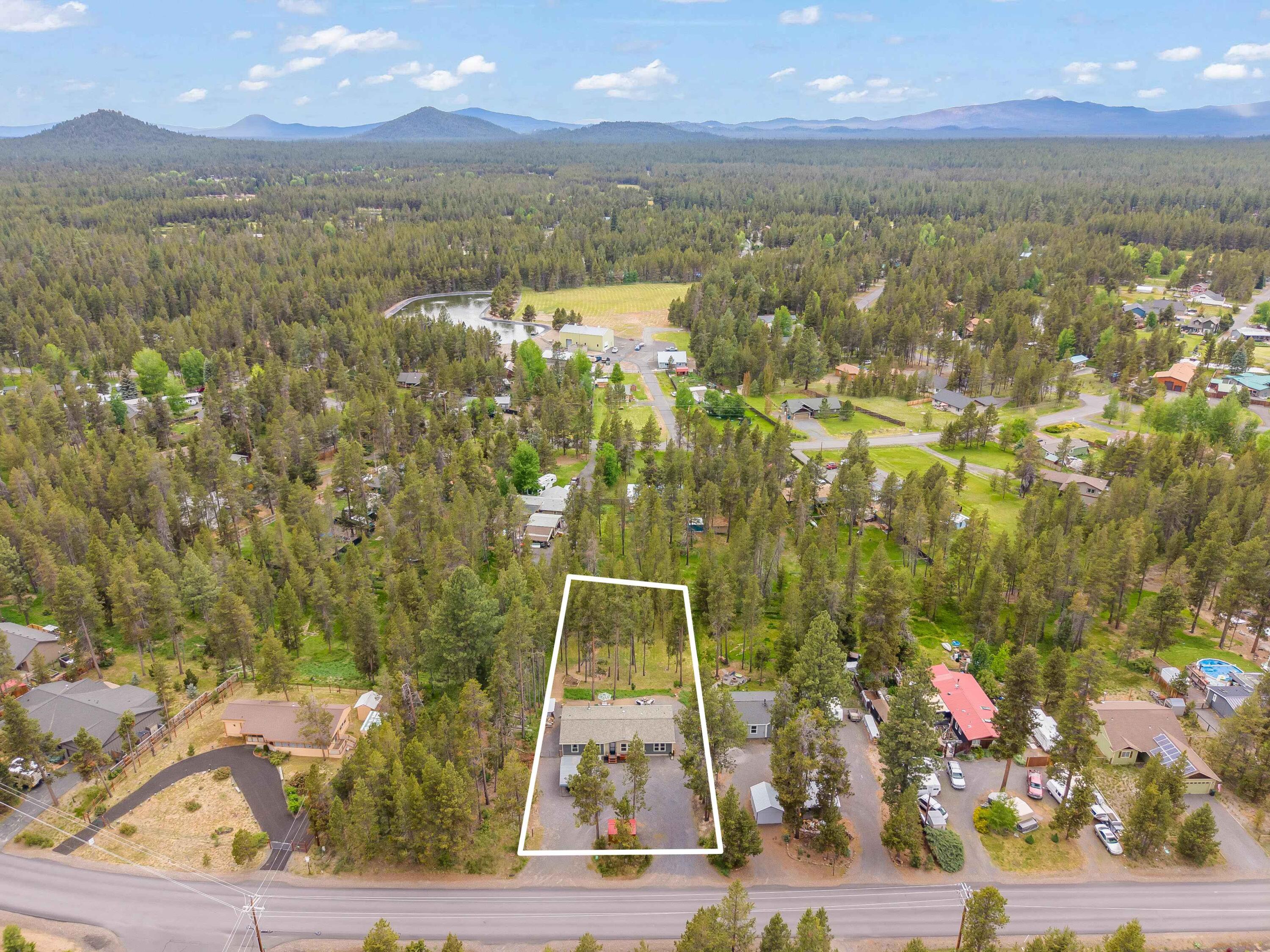 55823 Snow Goose Road Bend, OR 97707 - Photo 2 of 36 a view of lake view and mountain view