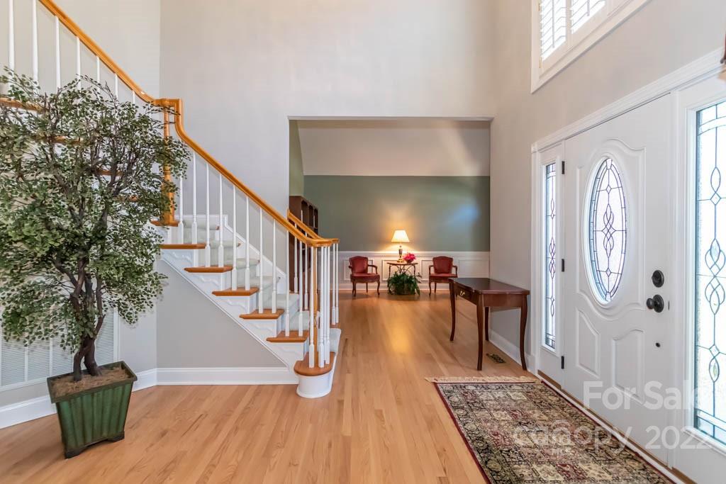 1629 Stevens Ridge Road Matthews, NC 28105 - Photo 11 of 39 a living room with furniture and a wooden floor