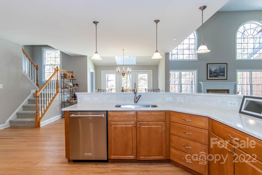 1629 Stevens Ridge Road Matthews, NC 28105 - Photo 24 of 39 a view of a kitchen counter space and wooden floor