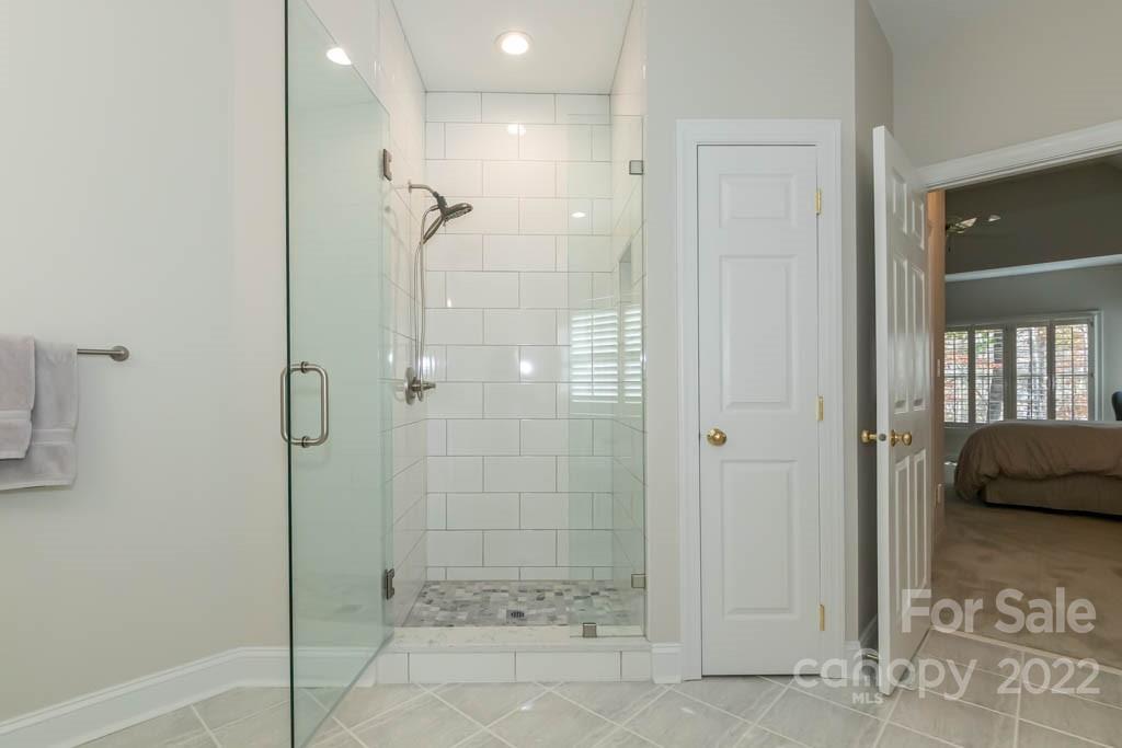 1629 Stevens Ridge Road Matthews, NC 28105 - Photo 28 of 39 a bathroom with a shower