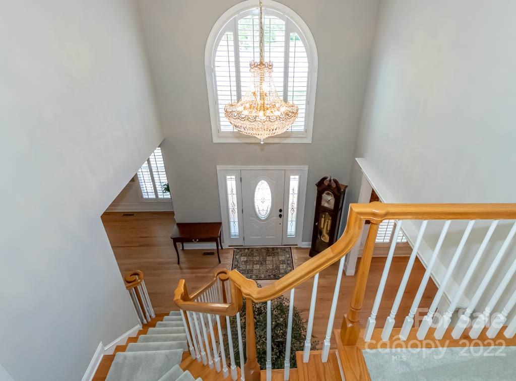 1629 Stevens Ridge Road Matthews, NC 28105 - Photo 30 of 39 a view of an entryway with wooden floor