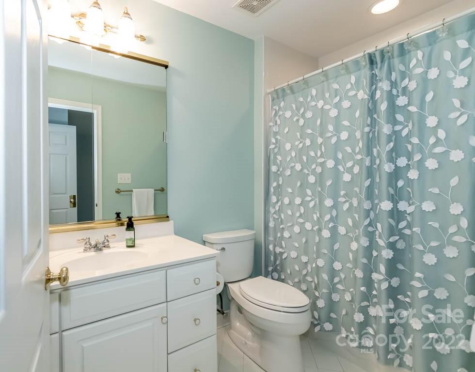 1629 Stevens Ridge Road Matthews, NC 28105 - Photo 36 of 39 a bathroom with a sink toilet and shower