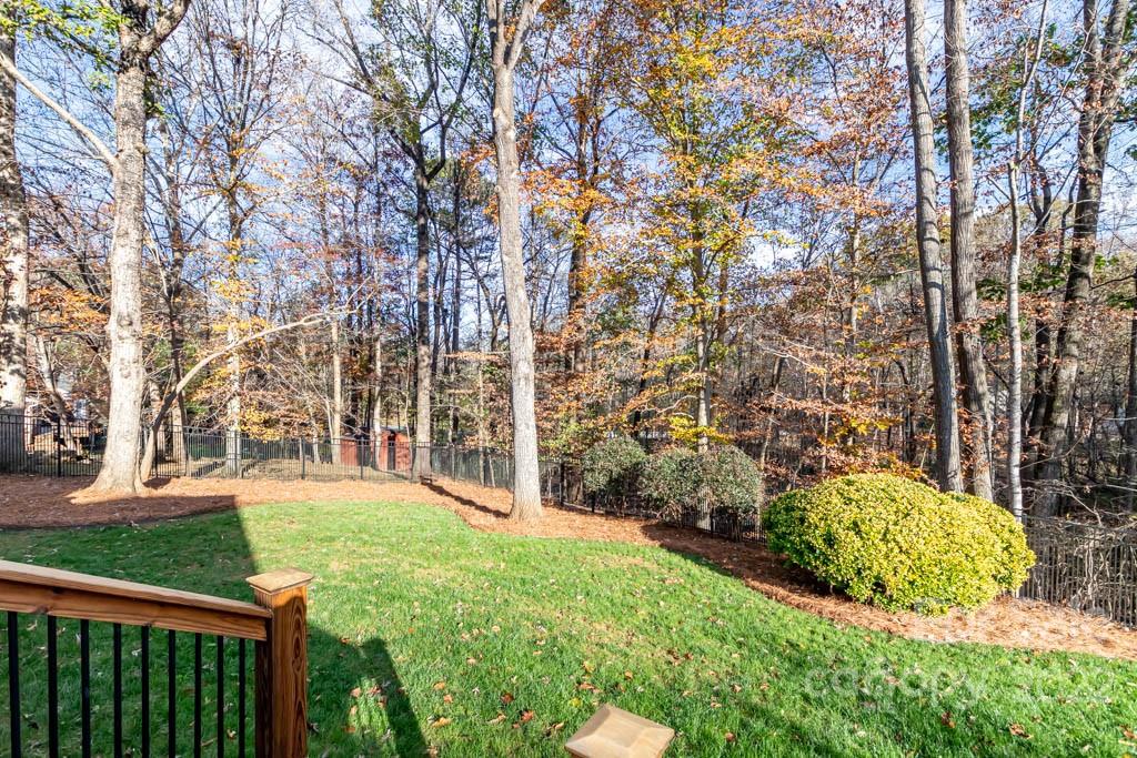 1629 Stevens Ridge Road Matthews, NC 28105 - Photo 6 of 39 a front view of a house with a yard