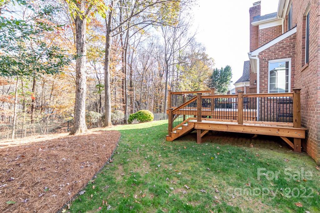 1629 Stevens Ridge Road Matthews, NC 28105 - Photo 7 of 39 a view of a house with backyard and sitting area