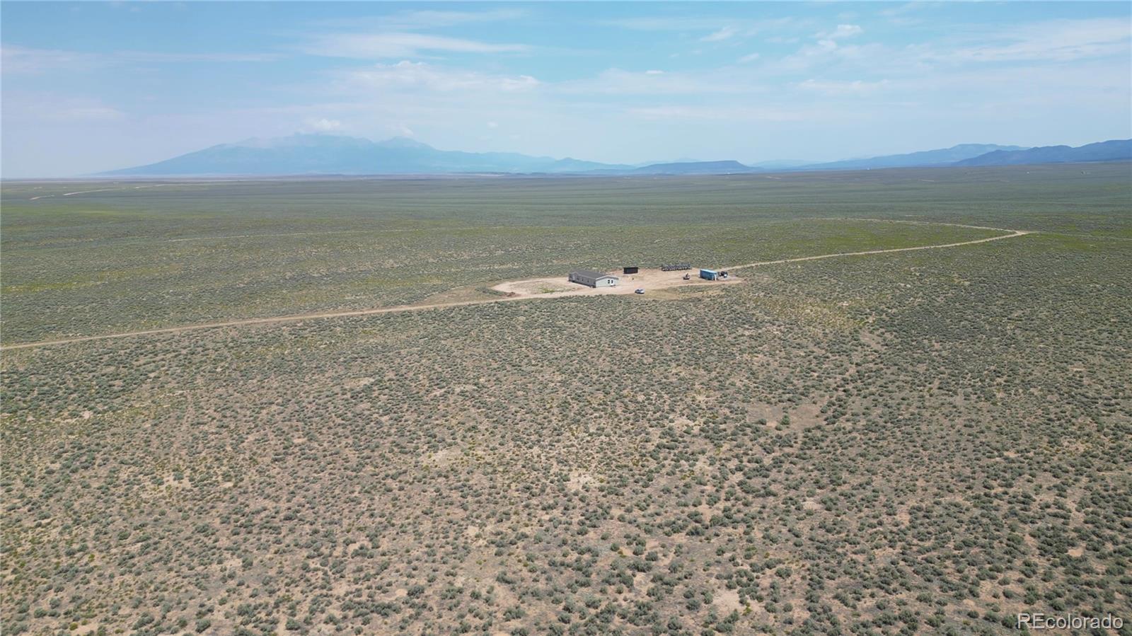 16383 Peacock Road Sanford, CO 81151 - Photo 28 of 33 a view of an ocean beach and mountain
