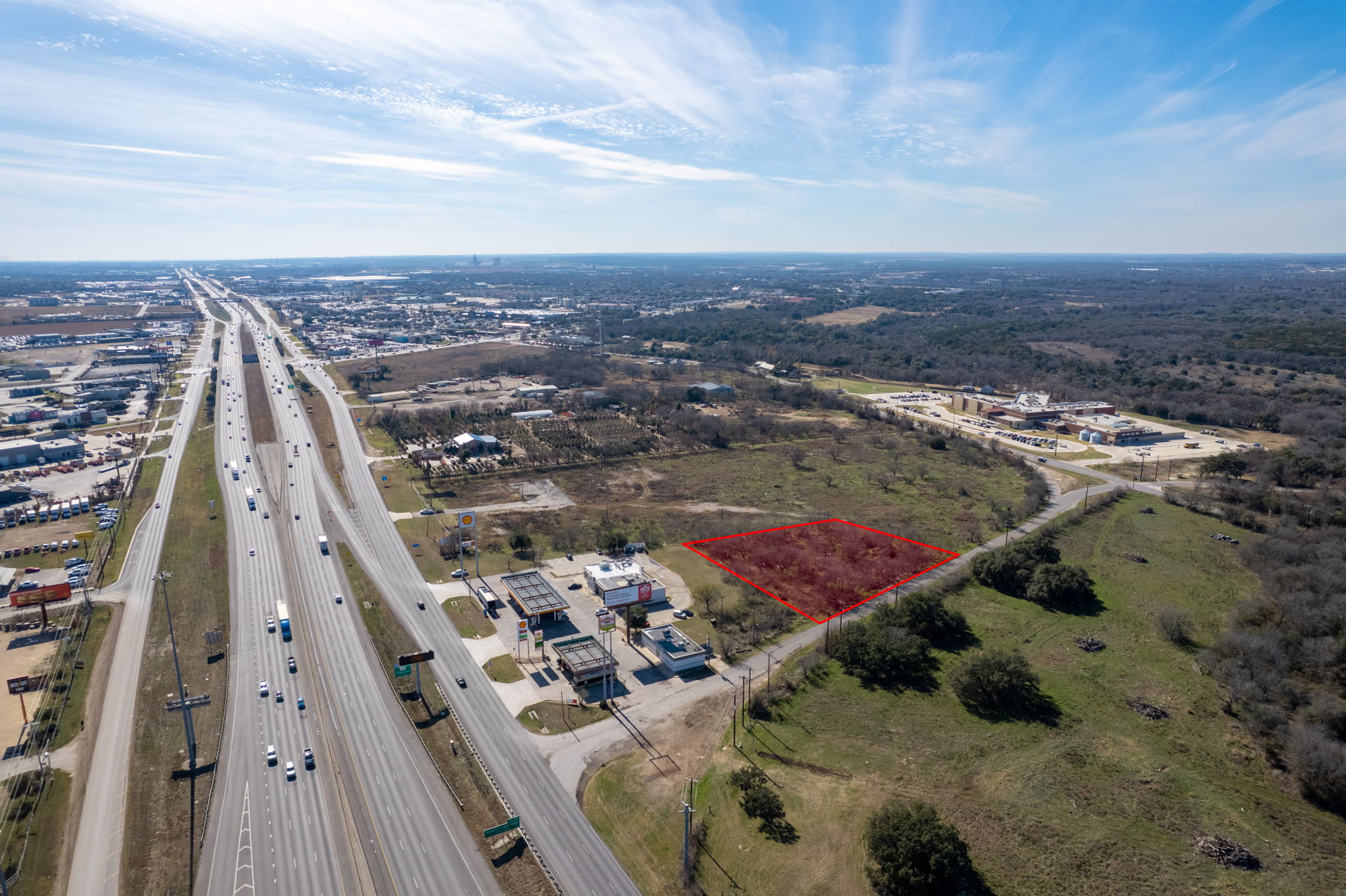 1701 Manchaca Springs Road Buda, TX 78610 - Photo 1 of 3 Aerial overview of property's location featuring property parcel outlined and a main thoroughfare