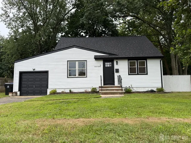 a front view of house with yard