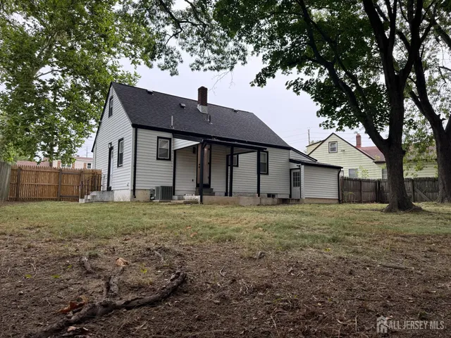 a house view with a backyard space
