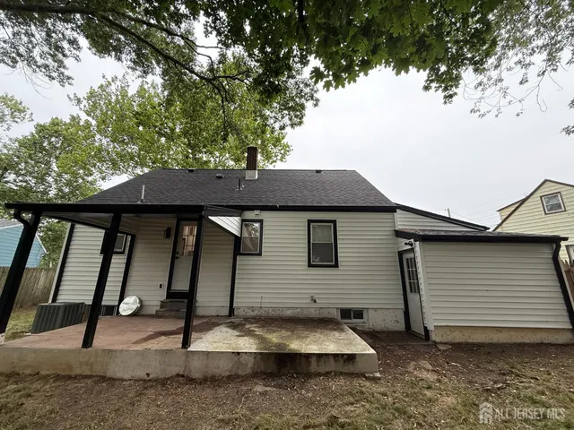 a view of a small white house