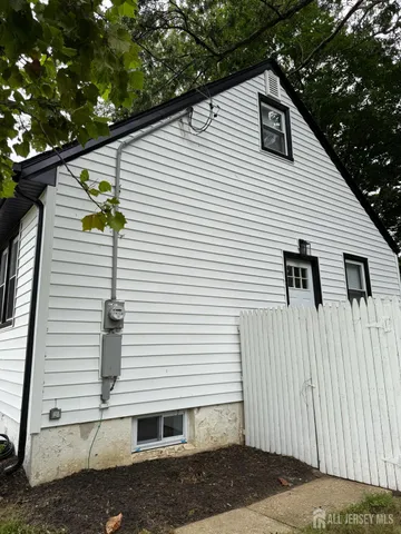 a side view of a white house