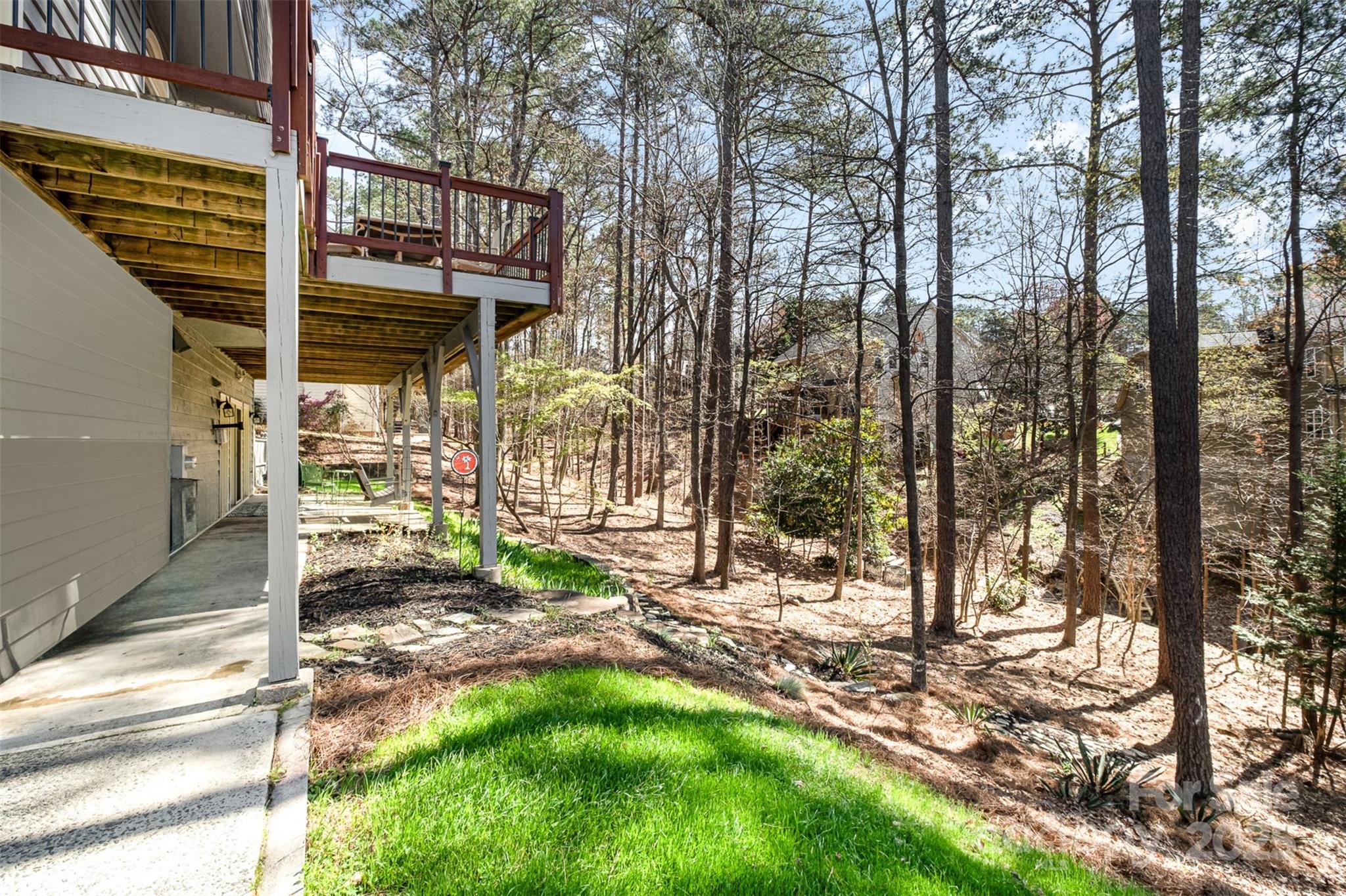 11122 Windgate Court Tega Cay, SC 29708 - Photo 35 of 48 a view of a house with a yard and tree s
