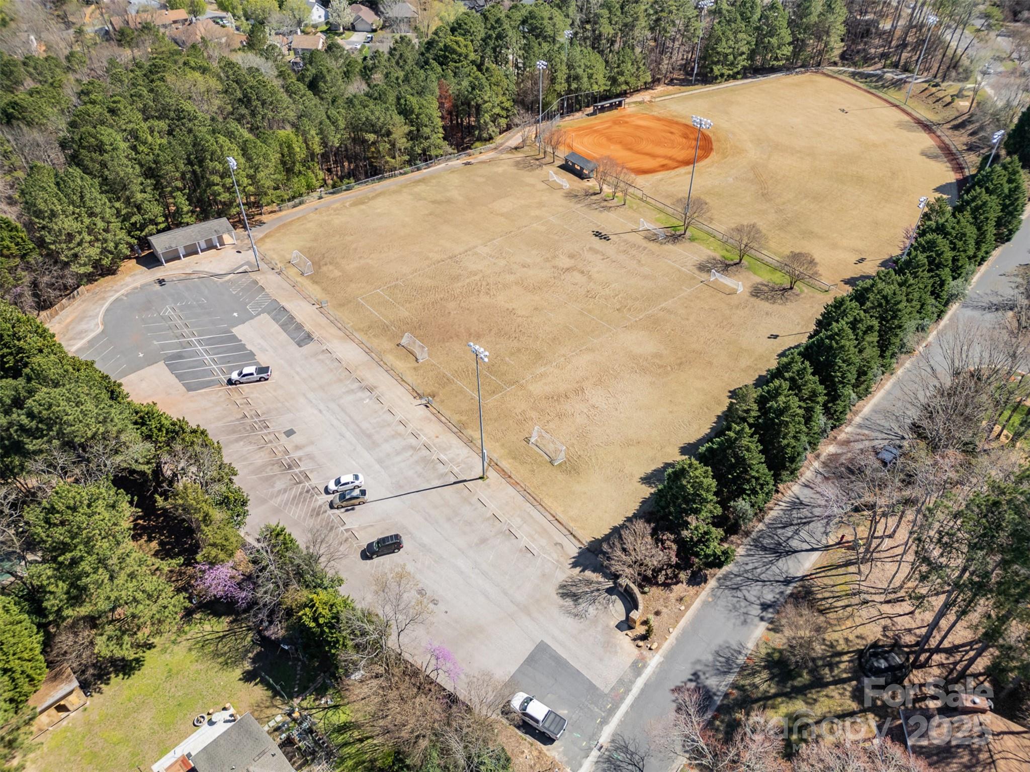 11122 Windgate Court Tega Cay, SC 29708 - Photo 45 of 48 an aerial view of a swimming pool