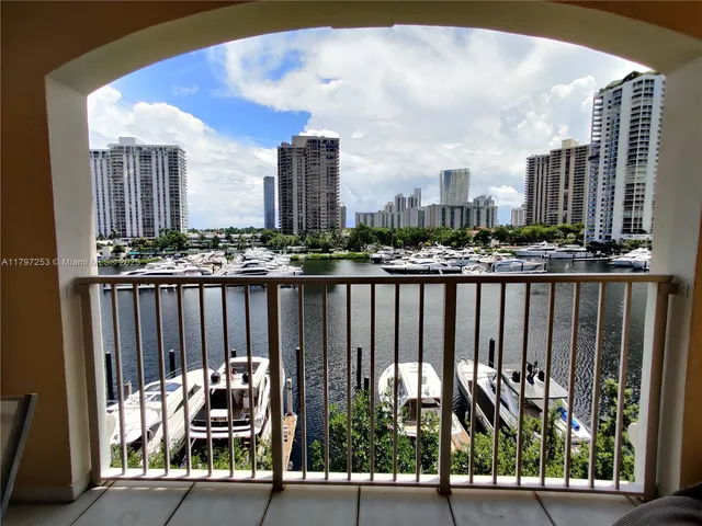 a view of a city with tall buildings