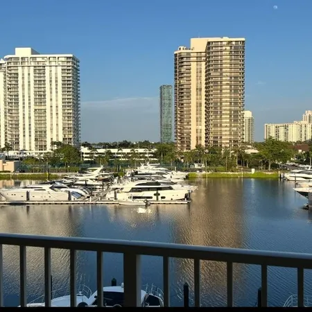 a view of swimming pool with outdoor seating