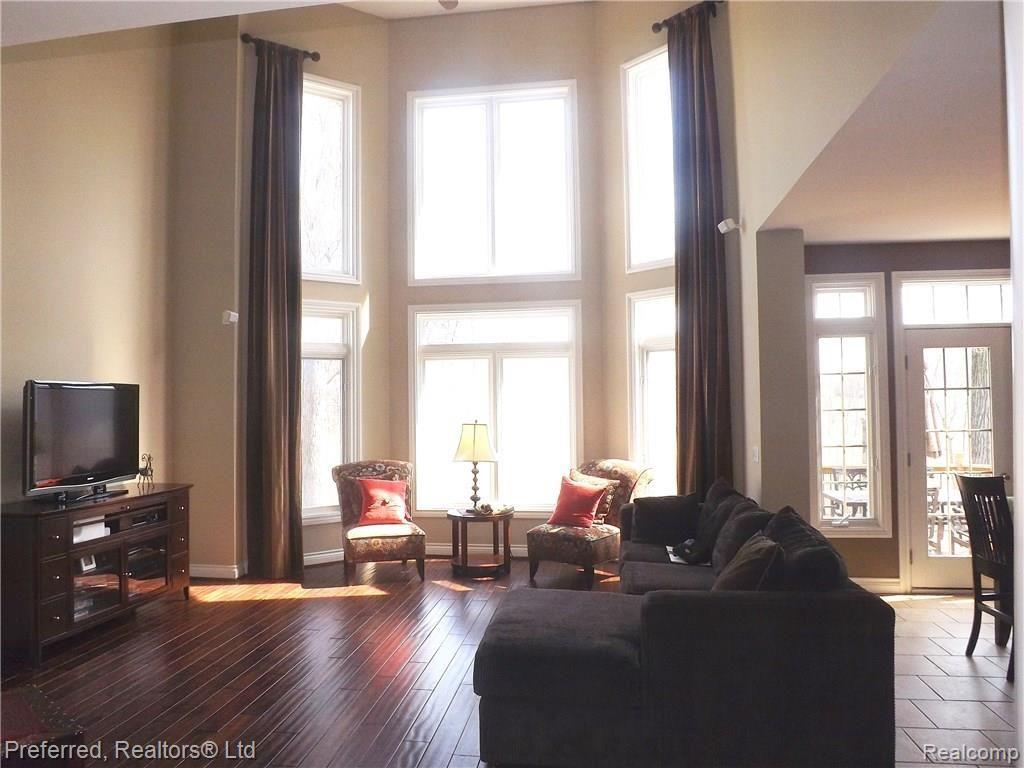 147 West Reed Lk Court Commerce Township, MI 48382 - Photo 4 of 46 Great Room w/Vaulted Ceiling