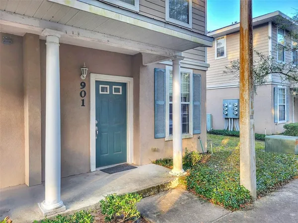 front view of a house with a small yard