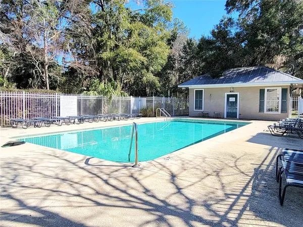 a view of a house with a swimming pool