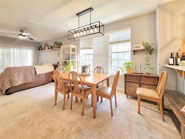 a view of a dining room with furniture