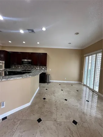 a view of kitchen with a sink