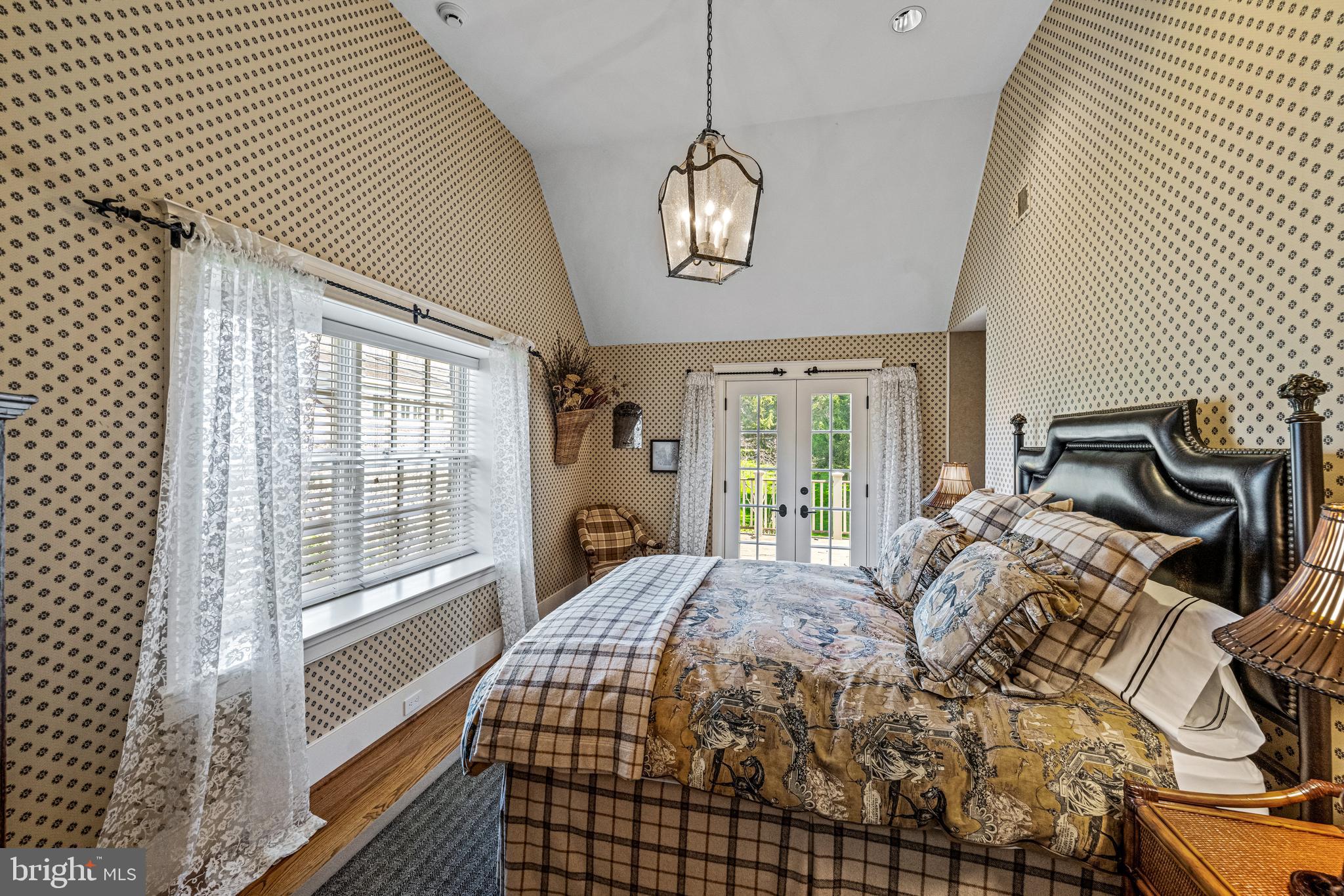 770 Godfrey Road Villanova, PA 19085 - Photo 111 of 150 a bedroom with a bed and wooden floor