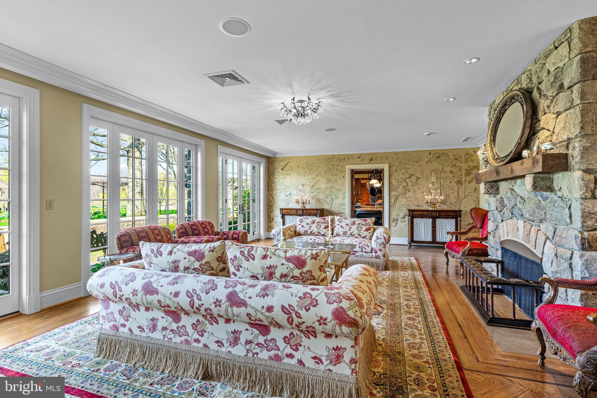 770 Godfrey Road Villanova, PA 19085 - Photo 20 of 150 a living room with furniture fireplace and a flat screen tv