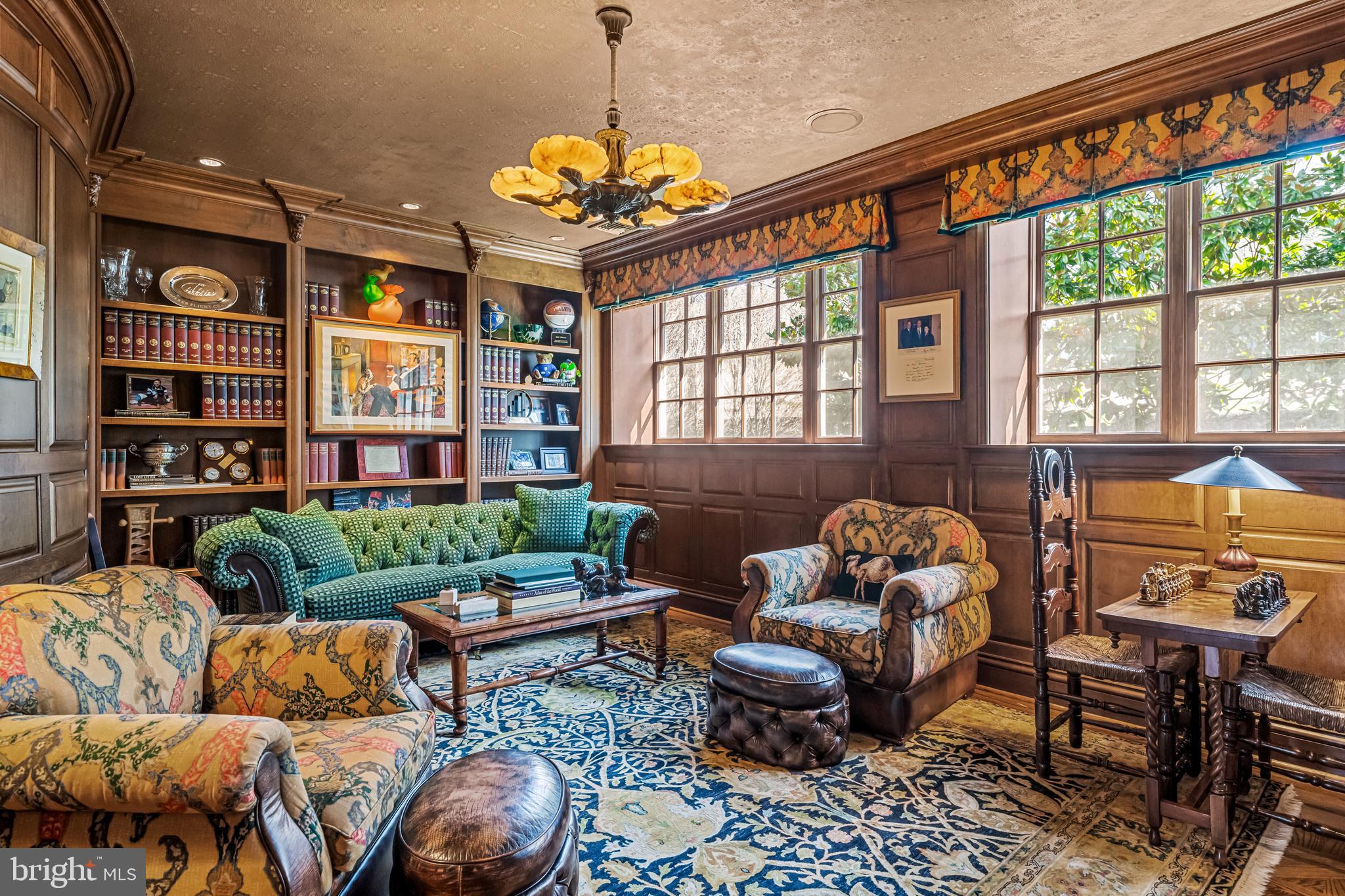 770 Godfrey Road Villanova, PA 19085 - Photo 49 of 150 a living room with furniture and a chandelier
