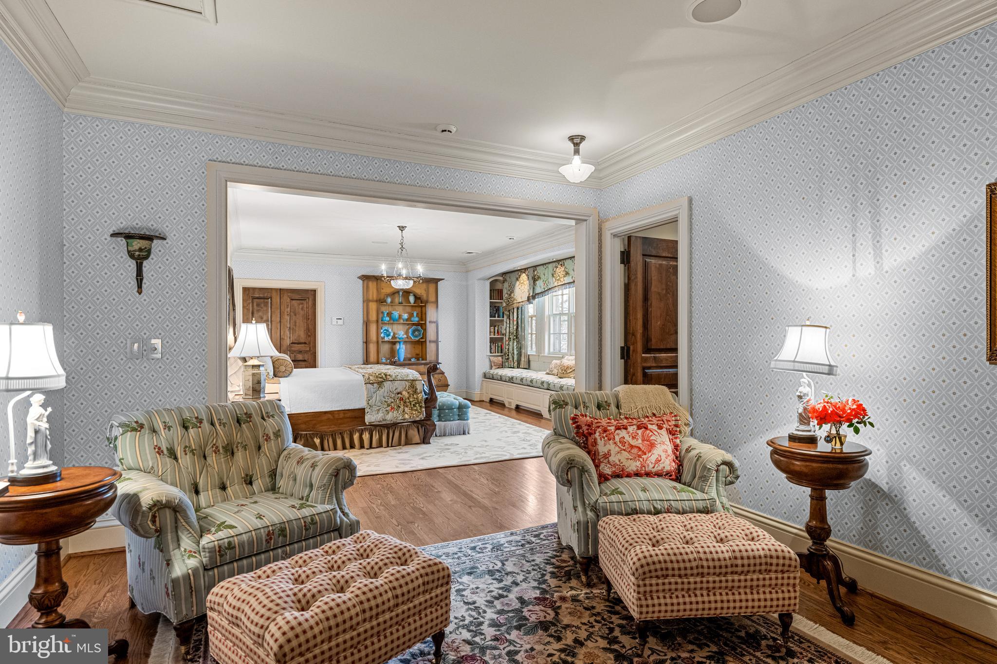 770 Godfrey Road Villanova, PA 19085 - Photo 65 of 150 a living room with furniture and a chandelier