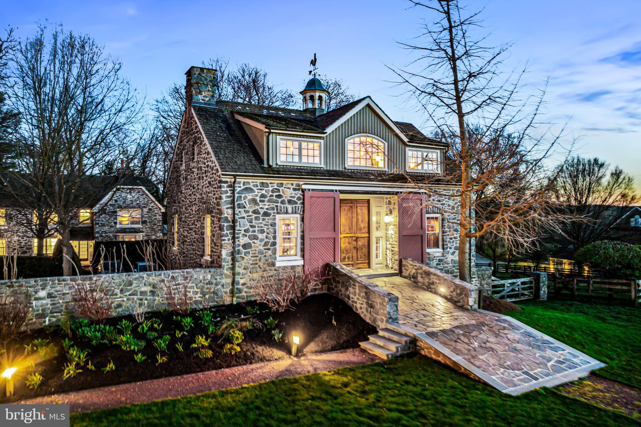770 Godfrey Road Villanova, PA 19085 - Photo 8 of 150 a front view of a house with garden