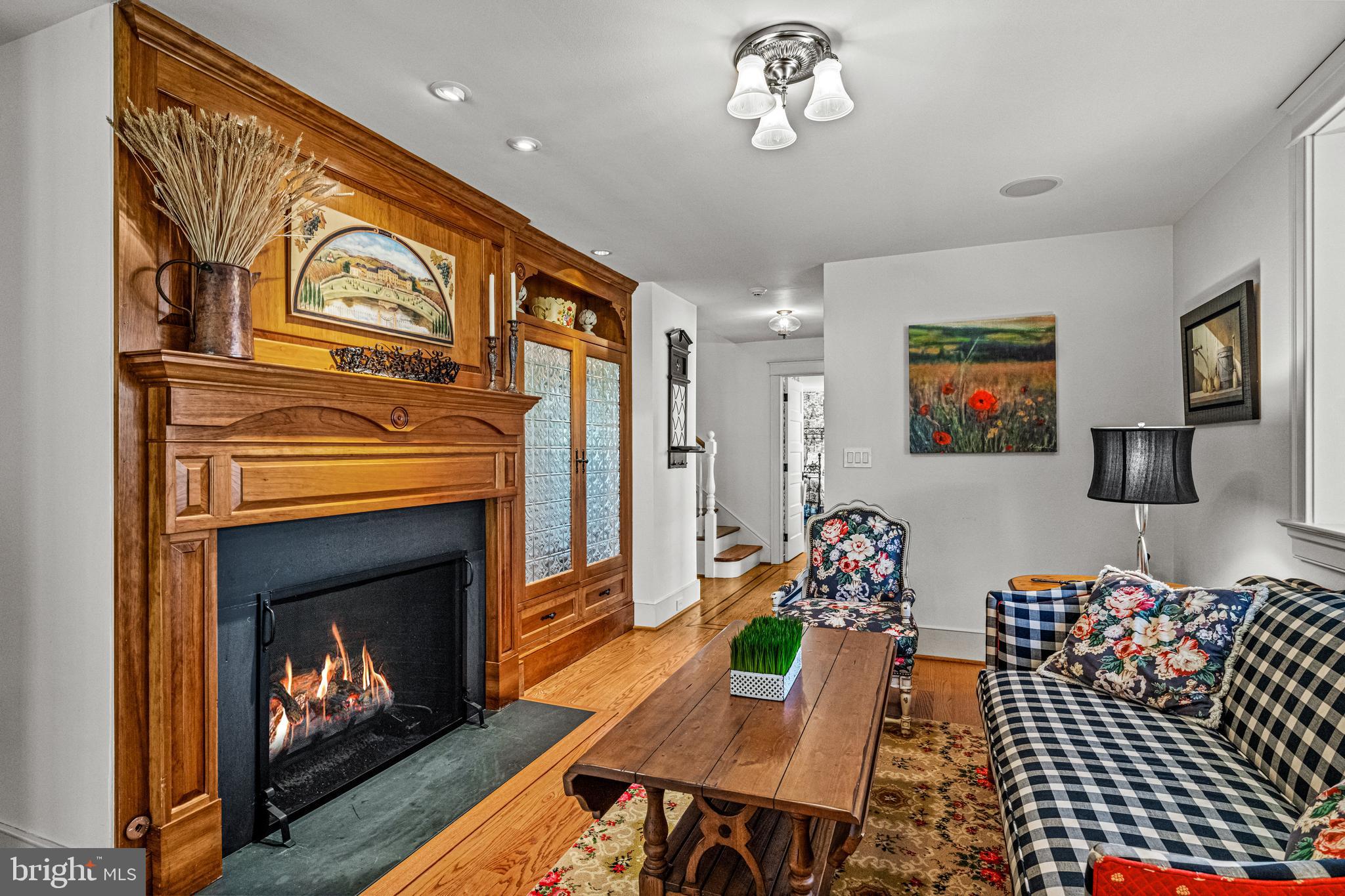 770 Godfrey Road Villanova, PA 19085 - Photo 99 of 150 a living room with furniture and a fireplace