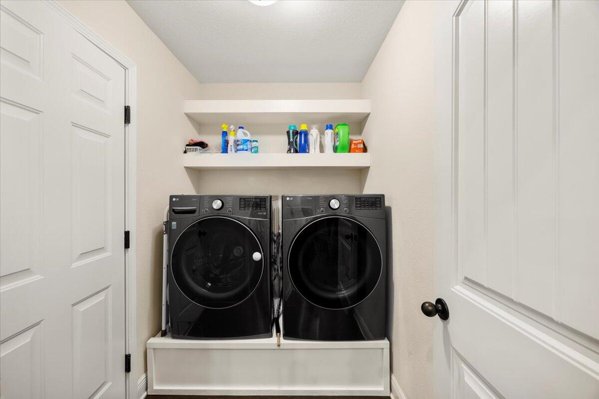 5755 Stream Mill Way Pace, FL 32571 - Photo 15 of 29 a utility room with dryer and washer