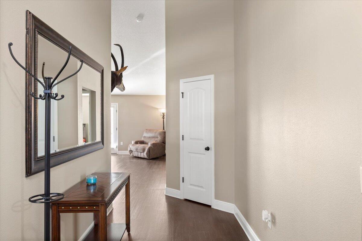 5755 Stream Mill Way Pace, FL 32571 - Photo 21 of 29 a view of living room with furniture and a window