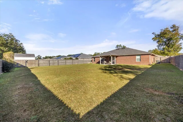 a view of a swimming pool with an ocean view