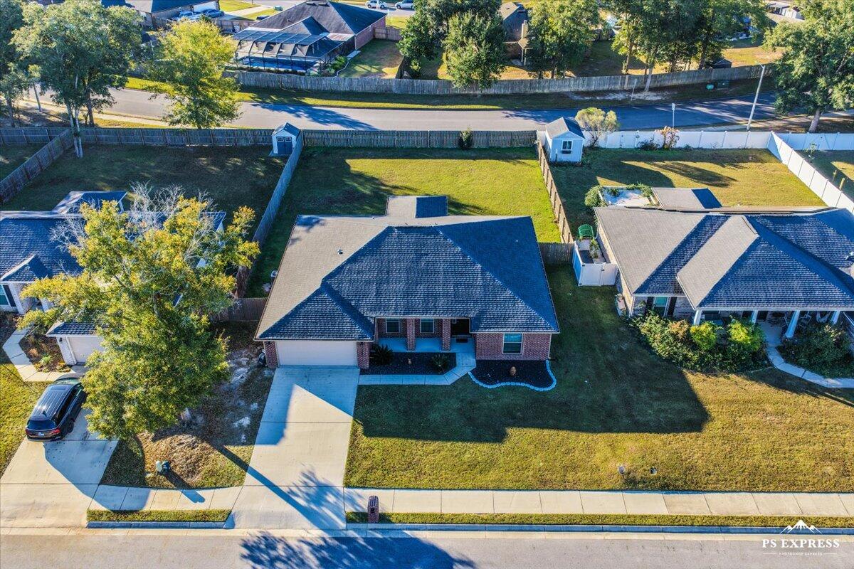 5755 Stream Mill Way Pace, FL 32571 - Photo 28 of 29 an aerial view of a house with swimming pool