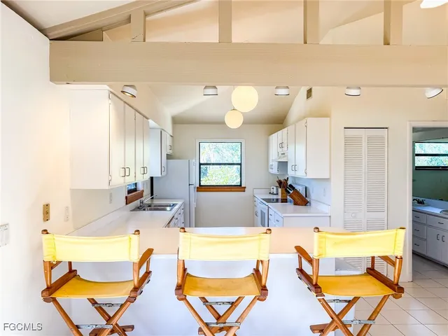 a view of a swimming pool with seating area