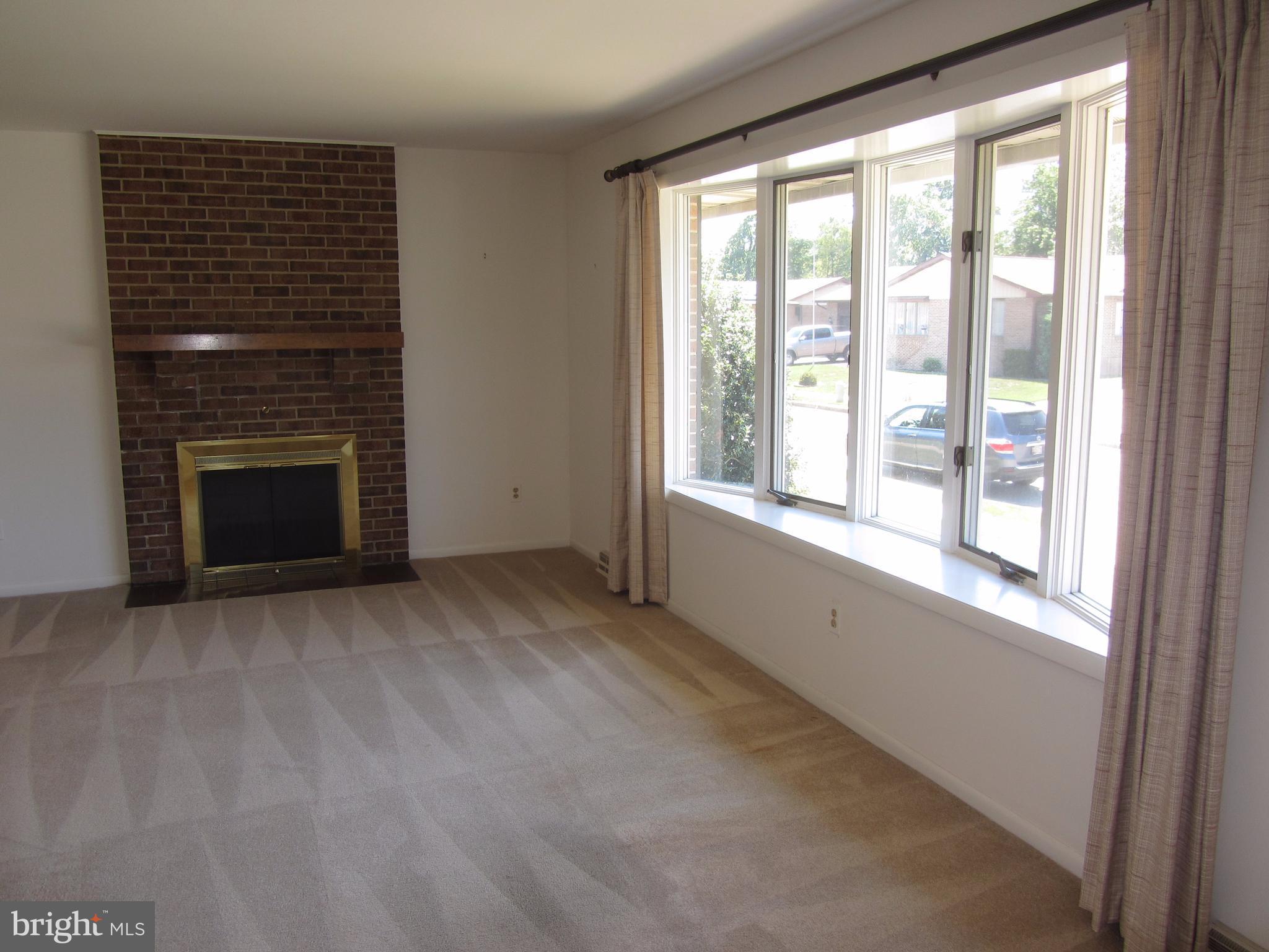 2406 Perring Woods Road Baltimore, MD 21234 - Photo 7 of 30 Living Room with Bay Window