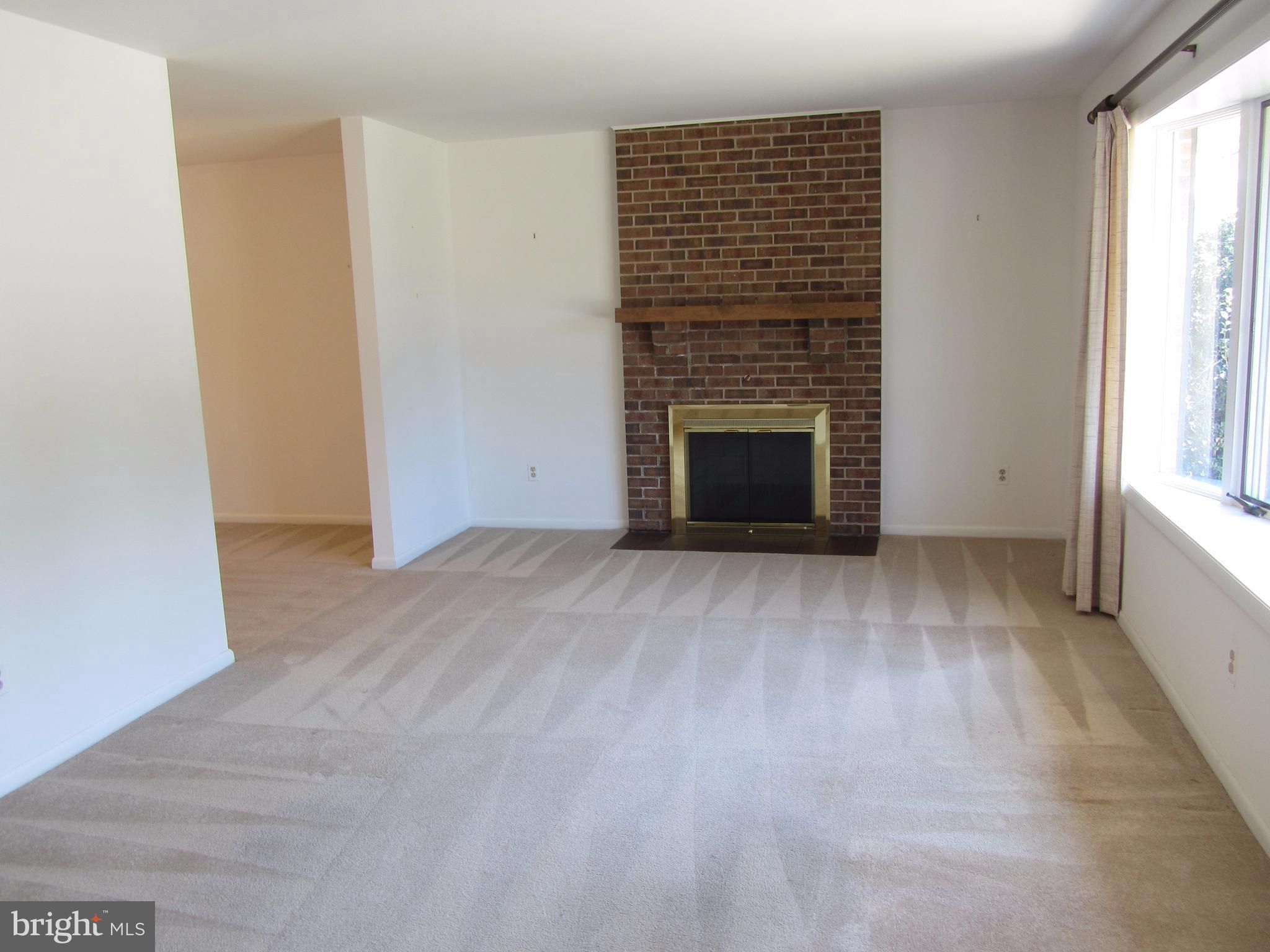 2406 Perring Woods Road Baltimore, MD 21234 - Photo 8 of 30 Living Room to Dining Room Entry