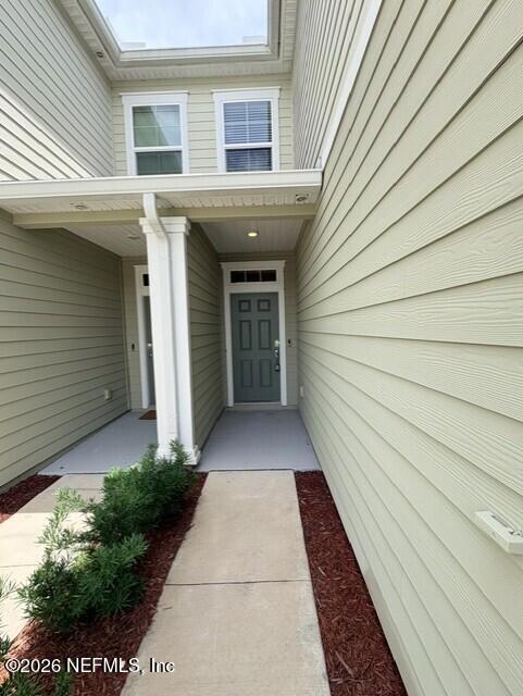 177 Redbud Road Palm Coast, FL 32137 - Photo 4 of 44 WalkToFrontWwindows