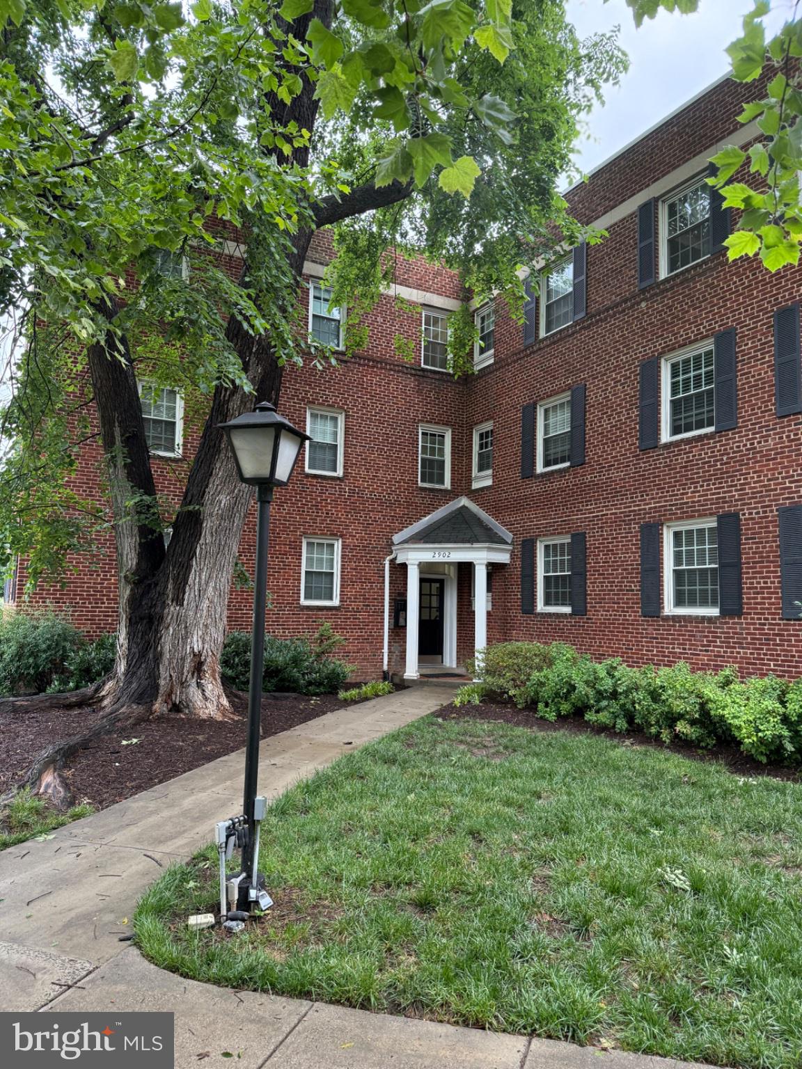 Charming brick apartment entrance.
