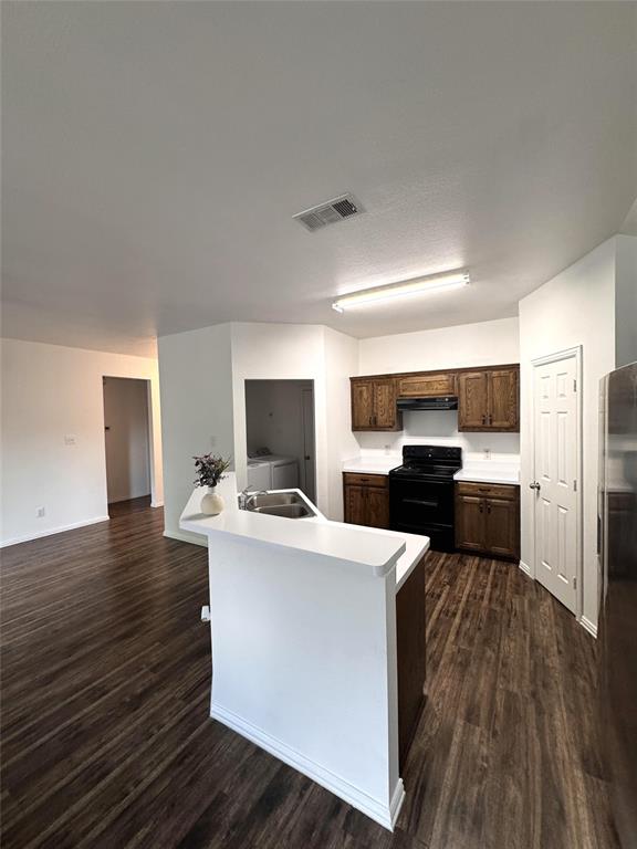 2831 Painted Trail Dallas, TX 75237 - Photo 9 of 14 a living room with a couch and a wooden floor