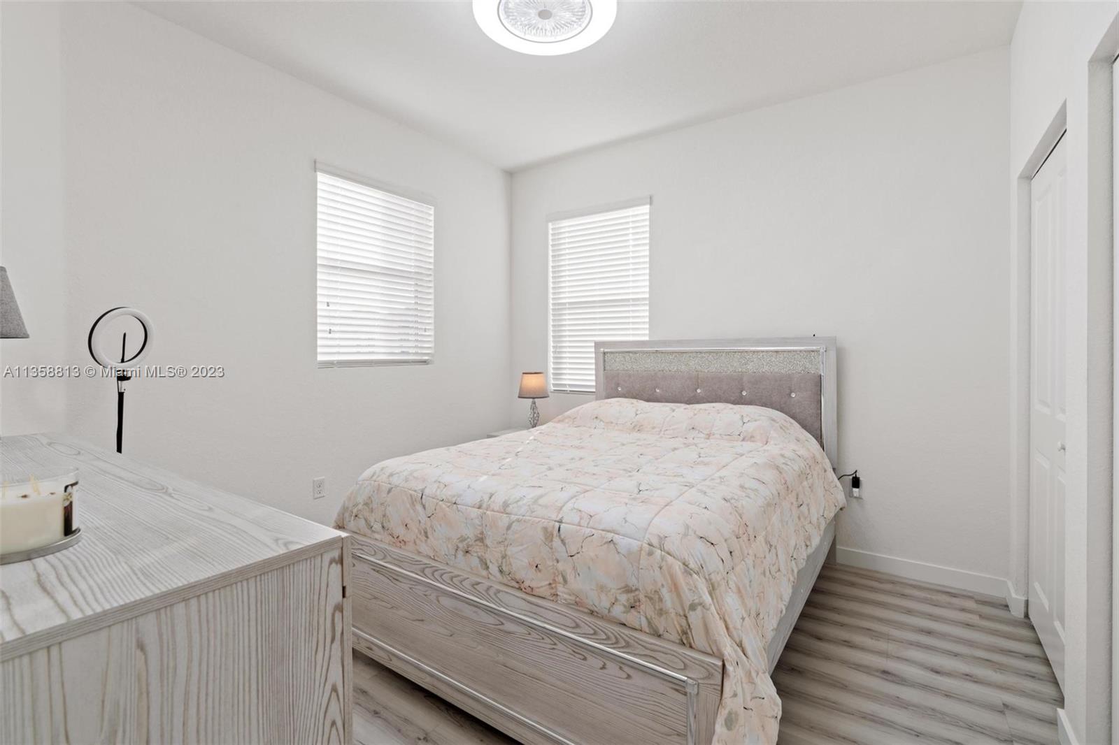 11744 Southwest 244 Street Homestead, FL 33032 - Photo 20 of 32 a bedroom with a bed and window