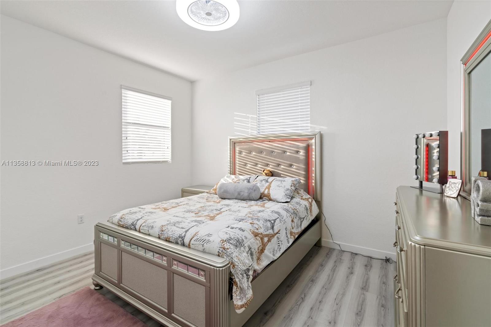 11744 Southwest 244 Street Homestead, FL 33032 - Photo 22 of 32 a bedroom with a bed and a window