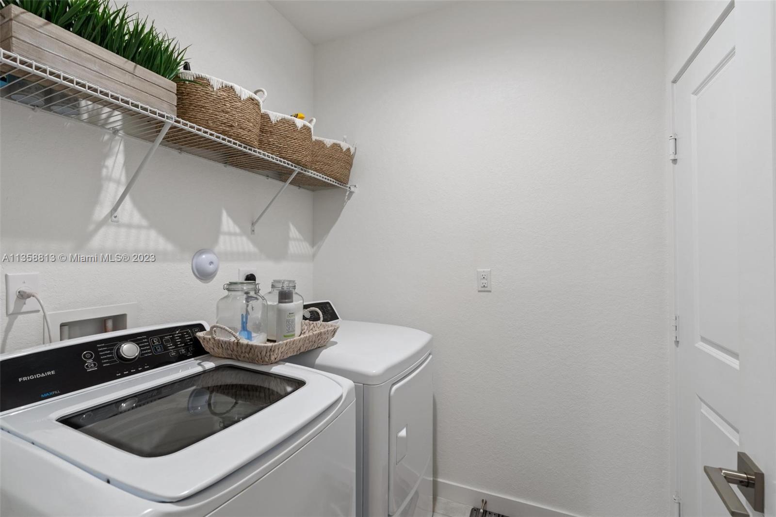 11744 Southwest 244 Street Homestead, FL 33032 - Photo 24 of 32 a utility room with dryer and sink