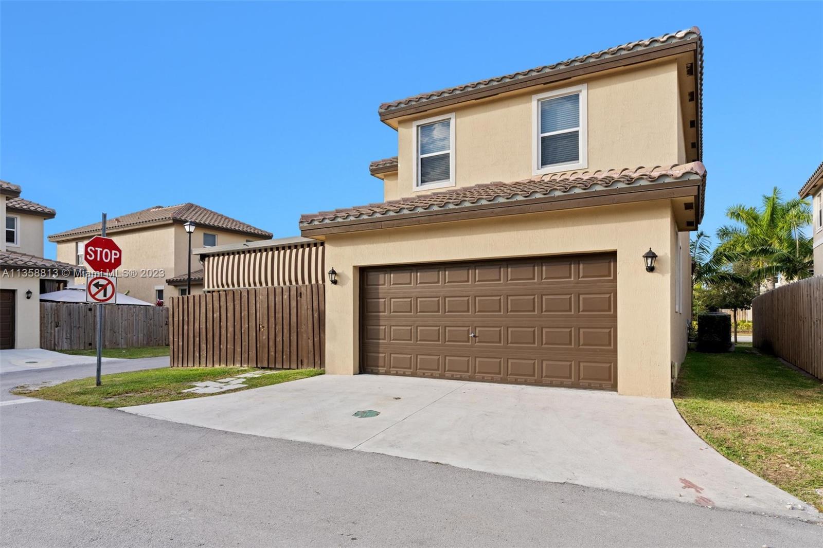 11744 Southwest 244 Street Homestead, FL 33032 - Photo 31 of 32 a front view of a house with a garage