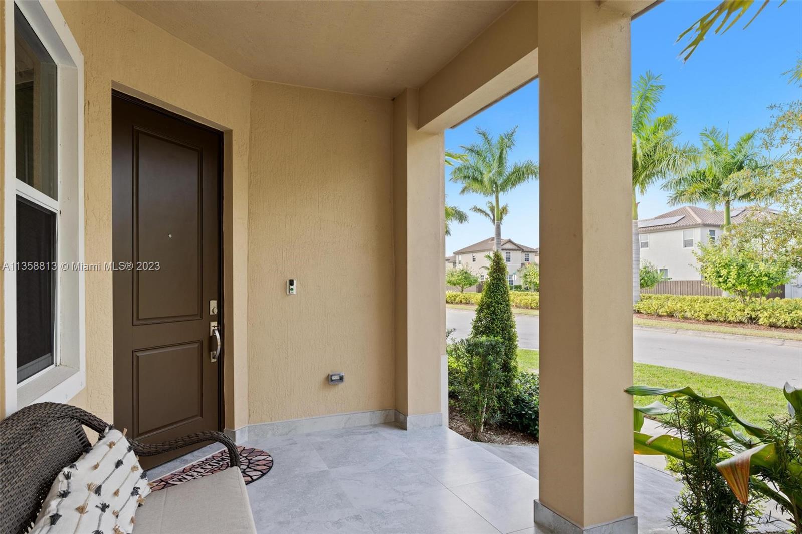 11744 Southwest 244 Street Homestead, FL 33032 - Photo 5 of 32 a bedroom with a bed and a window