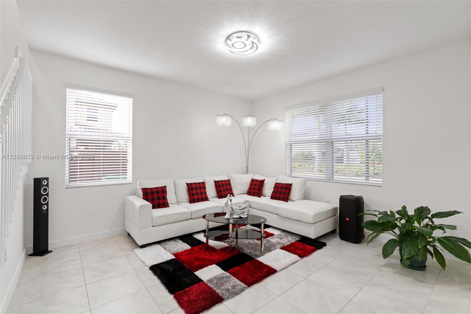 11744 Southwest 244 Street Homestead, FL 33032 - Photo 7 of 32 a living room with furniture and a window