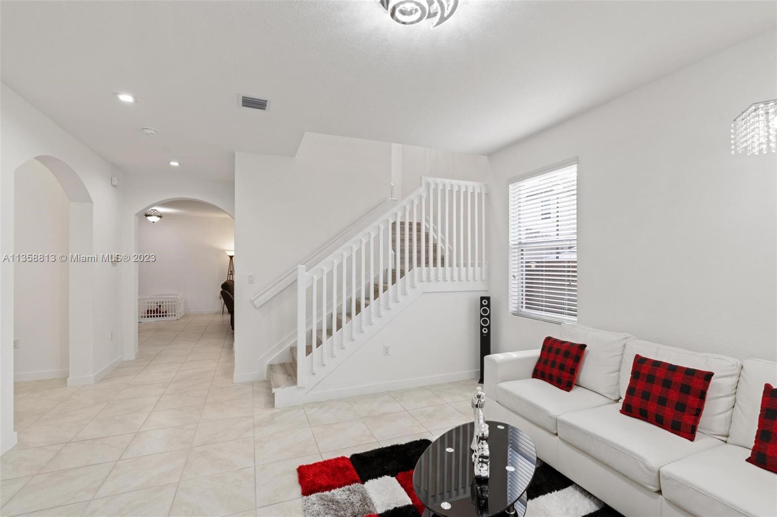 11744 Southwest 244 Street Homestead, FL 33032 - Photo 8 of 32 a living room with furniture and a window
