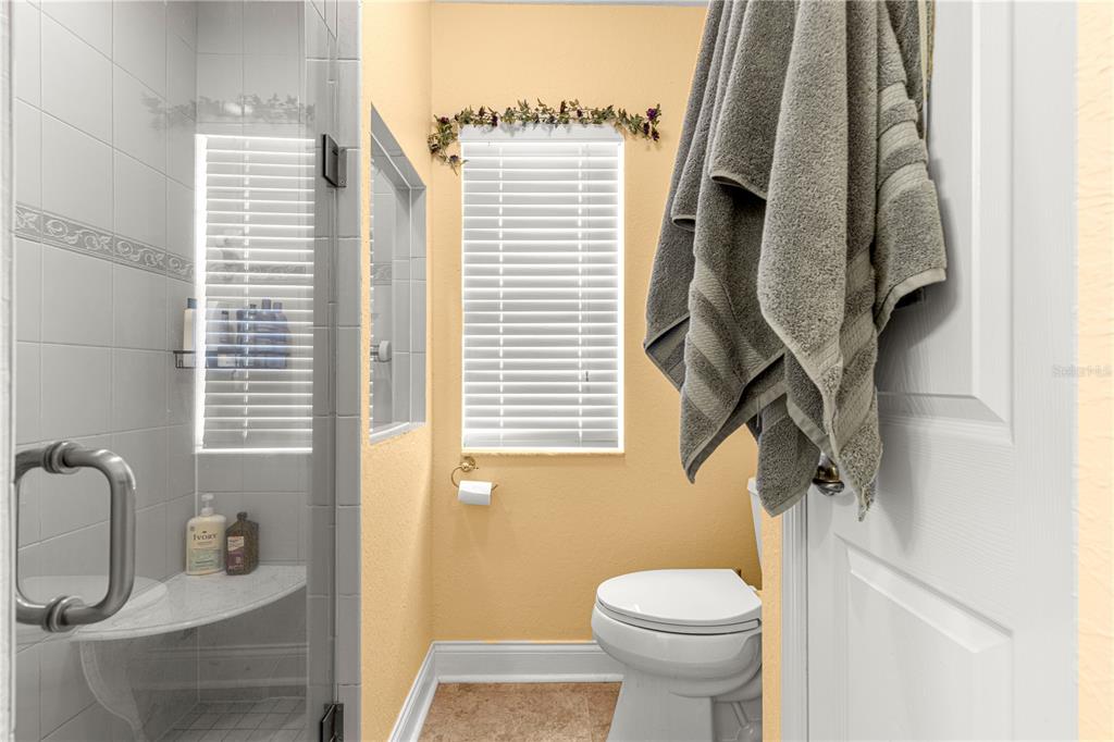 12459 Southeast 176th Loop Summerfield, FL 34491 - Photo 21 of 34 a bathroom with a sink and toilet