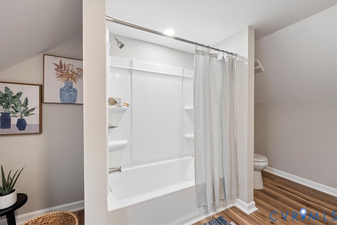 1989 Cox Road Blackstone, VA 23824 - Photo 24 of 44 a bathroom with a shower and a toilet
