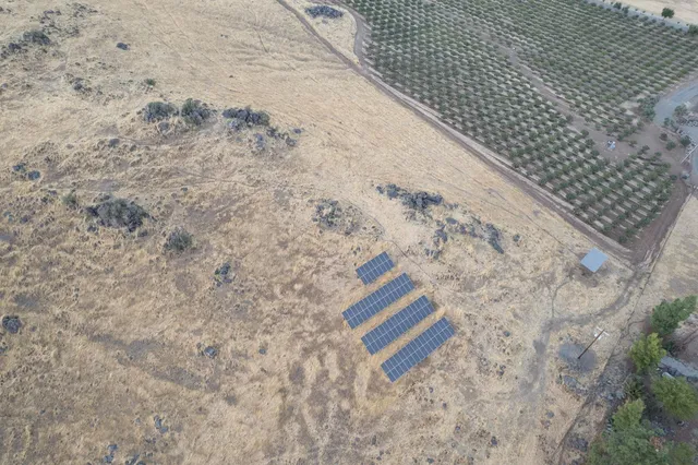 an aerial view of residential building and lake view