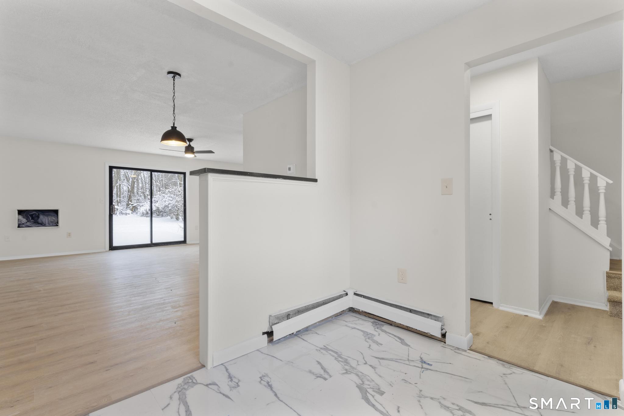 83 Sutton Place, Unit 83 Bloomfield, CT 06002 - Photo 7 of 29 a view of an empty room